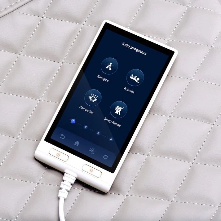 Touchscreen remote of a massage chair showing auto programs